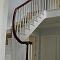 Traditional feature staircase with hardwood handrail (view1)